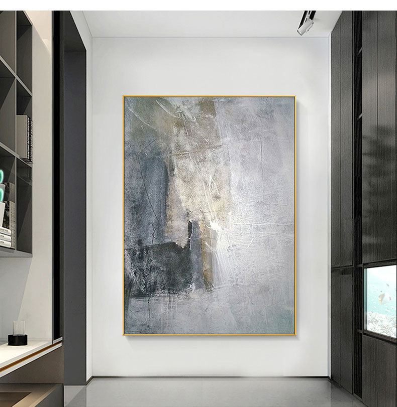 a painting hanging on a wall in a room