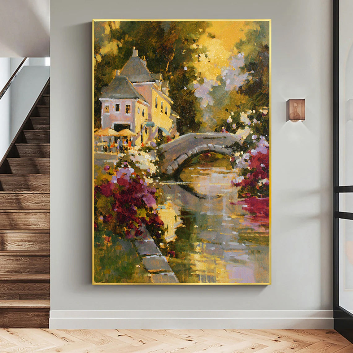 a painting hanging on a wall next to a stair case