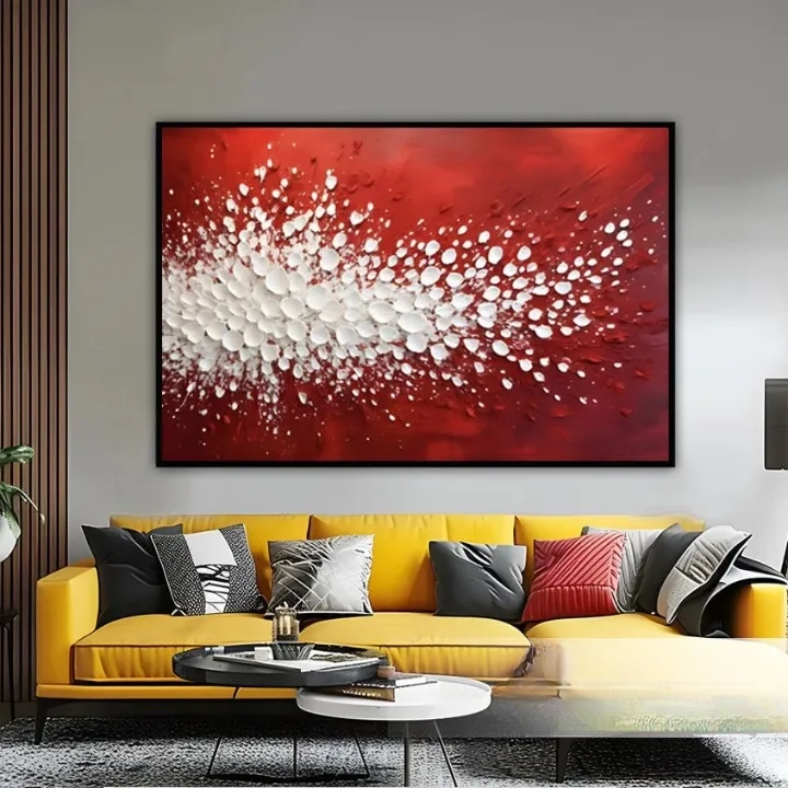 a modern living room with a large, vibrant red abstract painting hanging on the wall above a yellow sofa adorned with throw pillows.