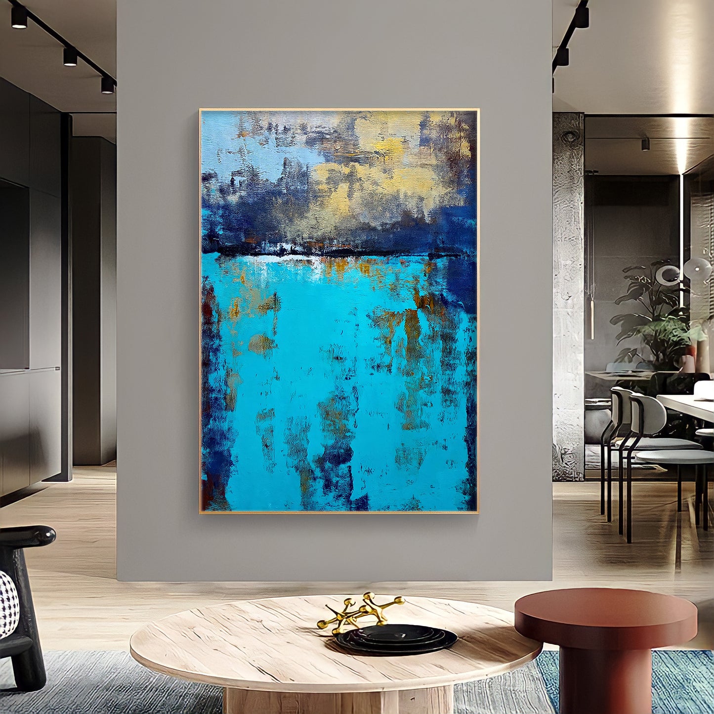 a painting hanging on a wall in a living room