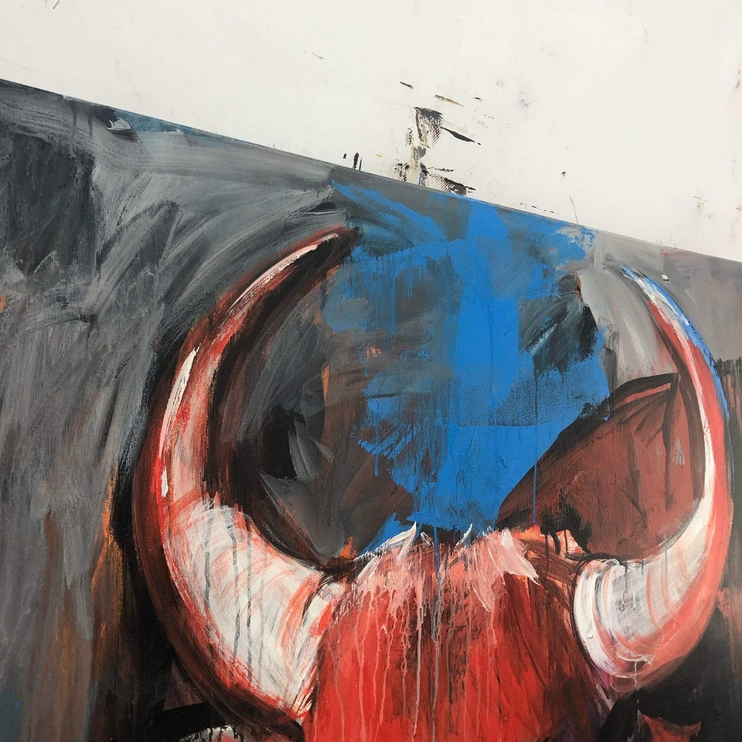 a painting of a bull painted on a wall