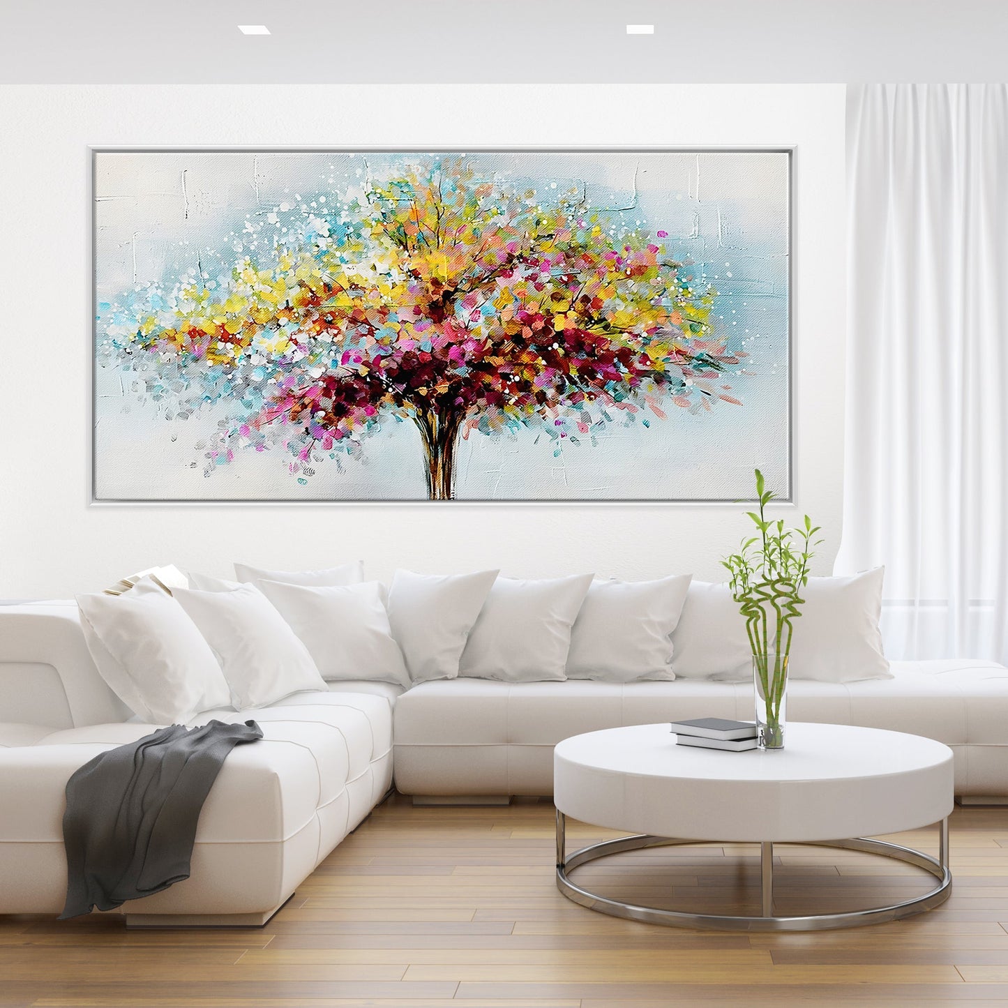 a living room with a large painting on the wall