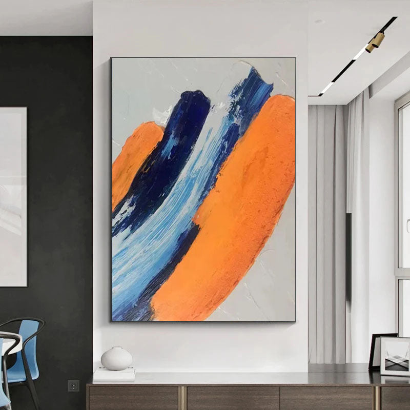 a painting hanging on a wall in a living room