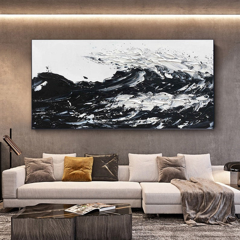 a living room with a large painting on the wall