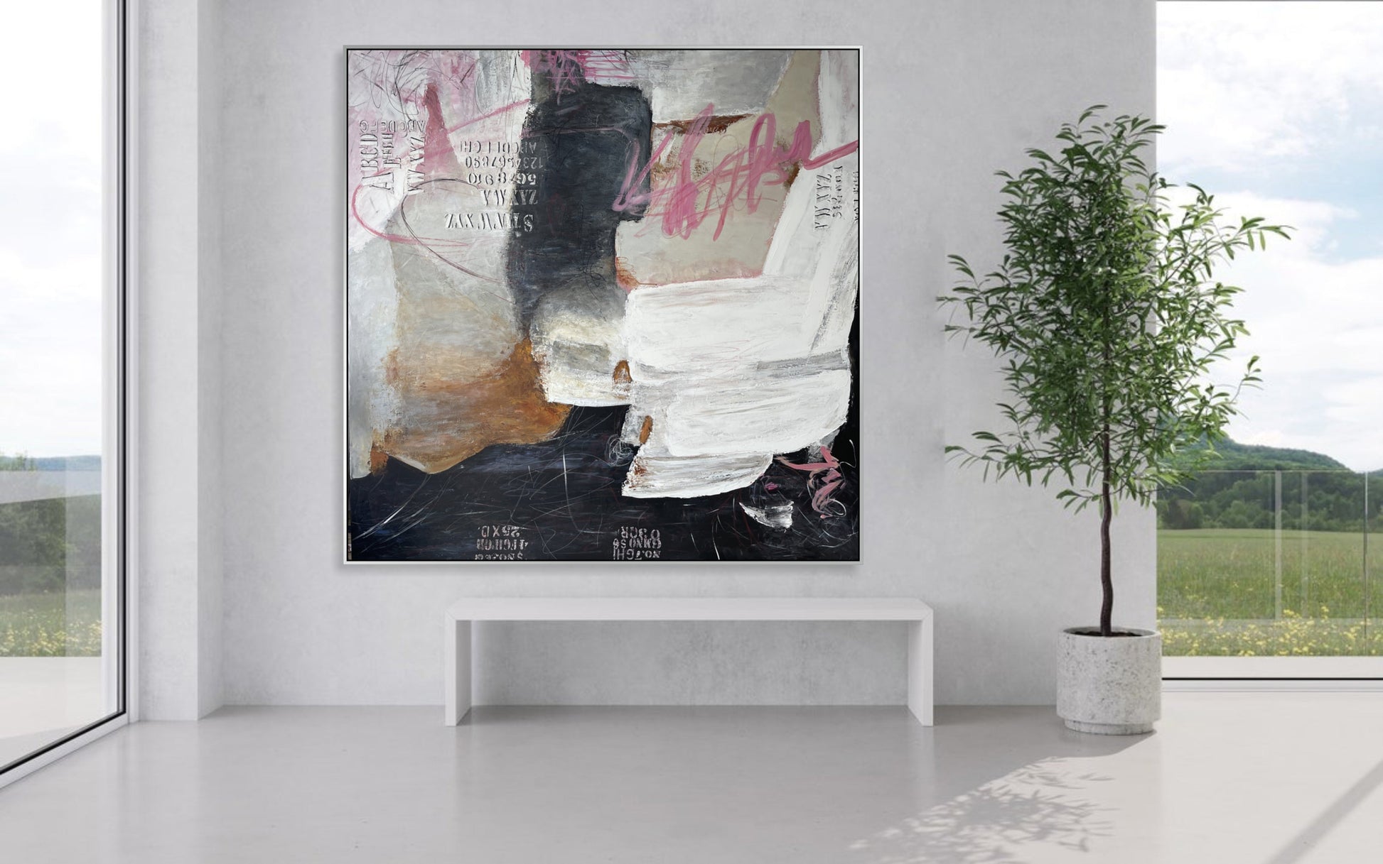 a painting hanging on a wall next to a potted plant