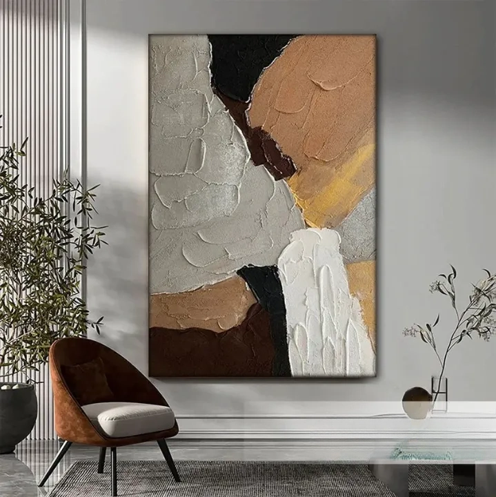 a large abstract painting hanging on a wall in a modern living room setting.