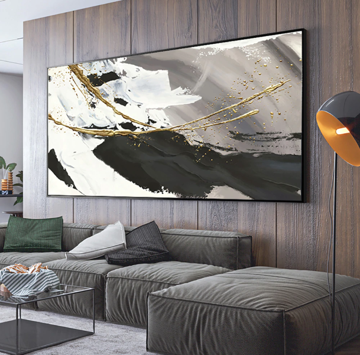 a living room with a large painting on the wall