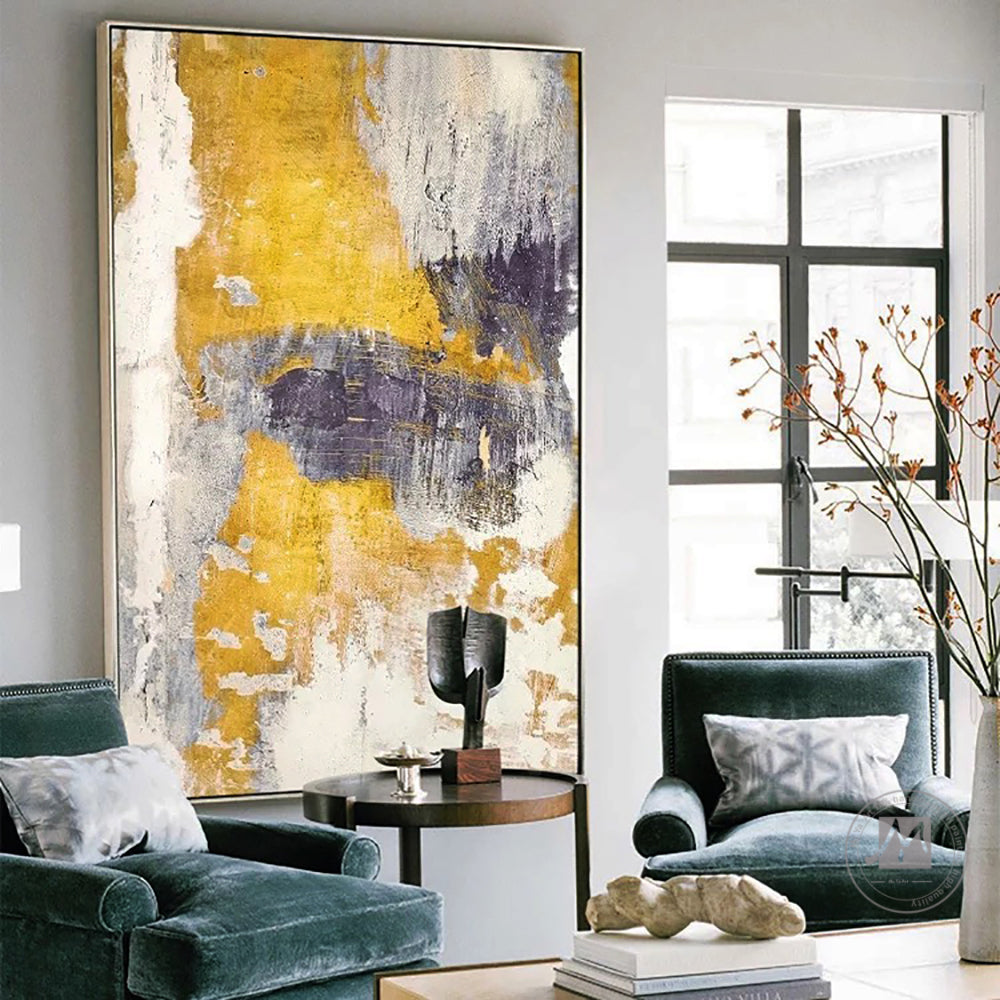 a living room filled with furniture and a painting on the wall