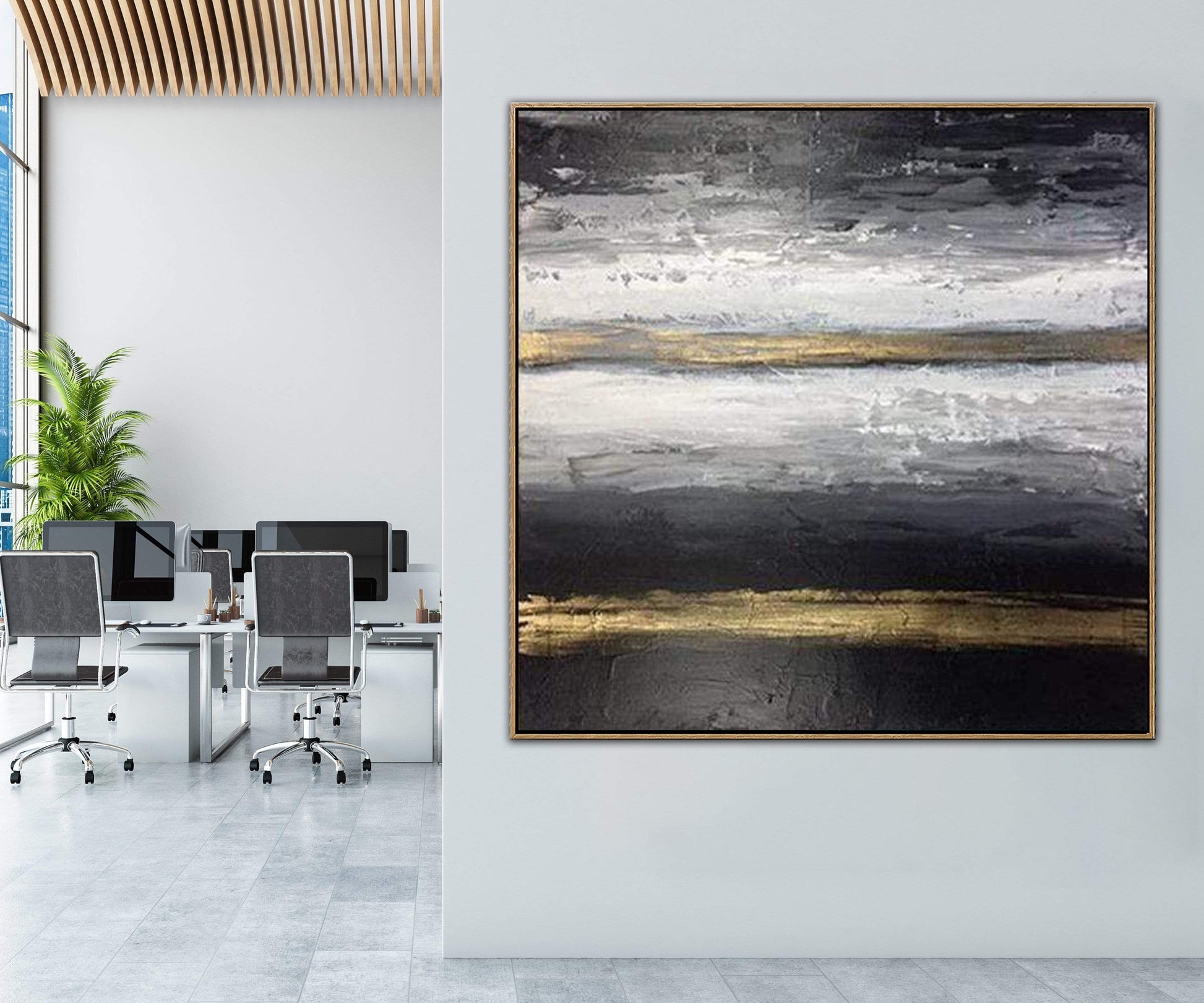 a painting hanging on a wall in an office