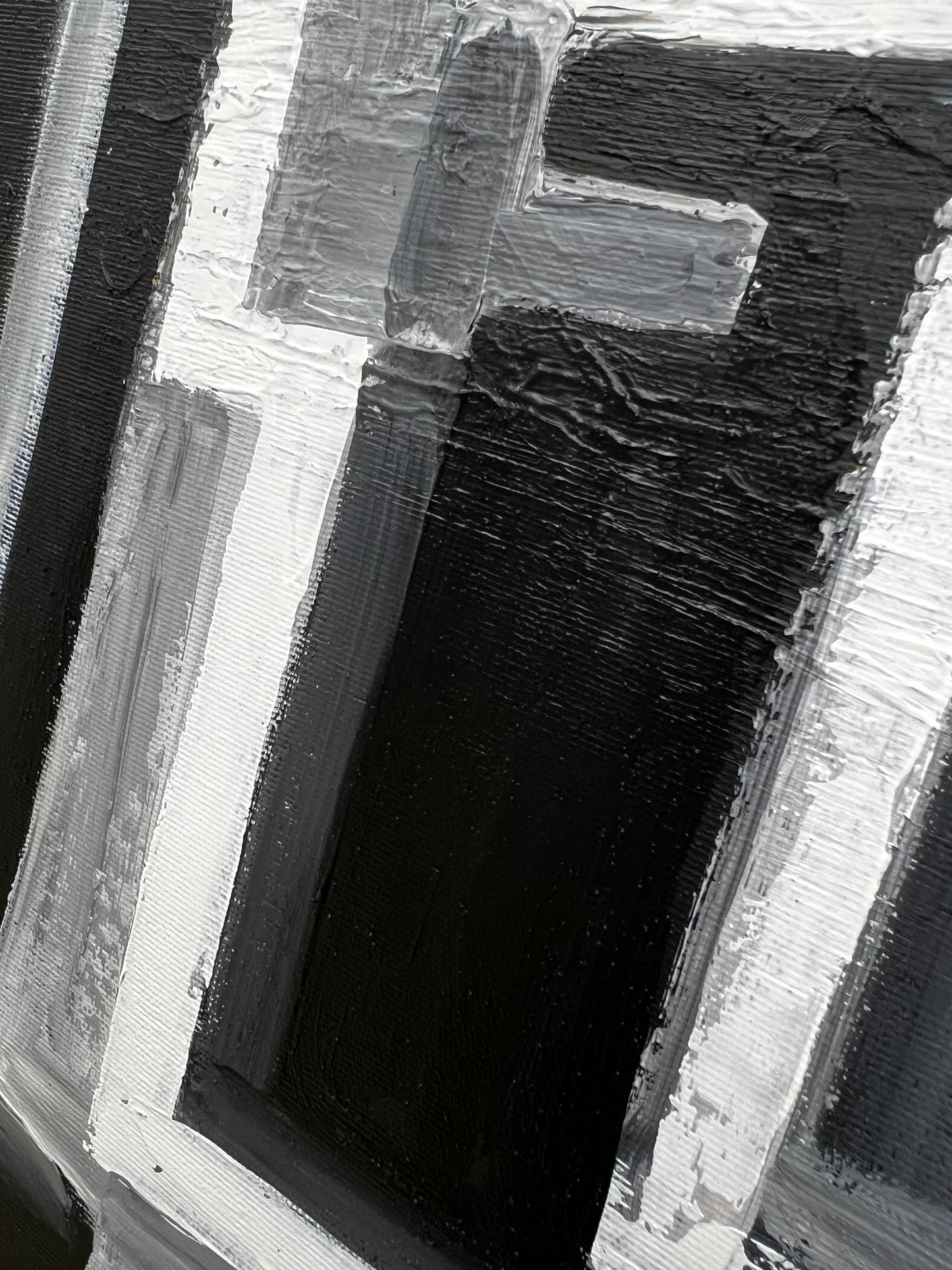 a black and white painting of the letter f