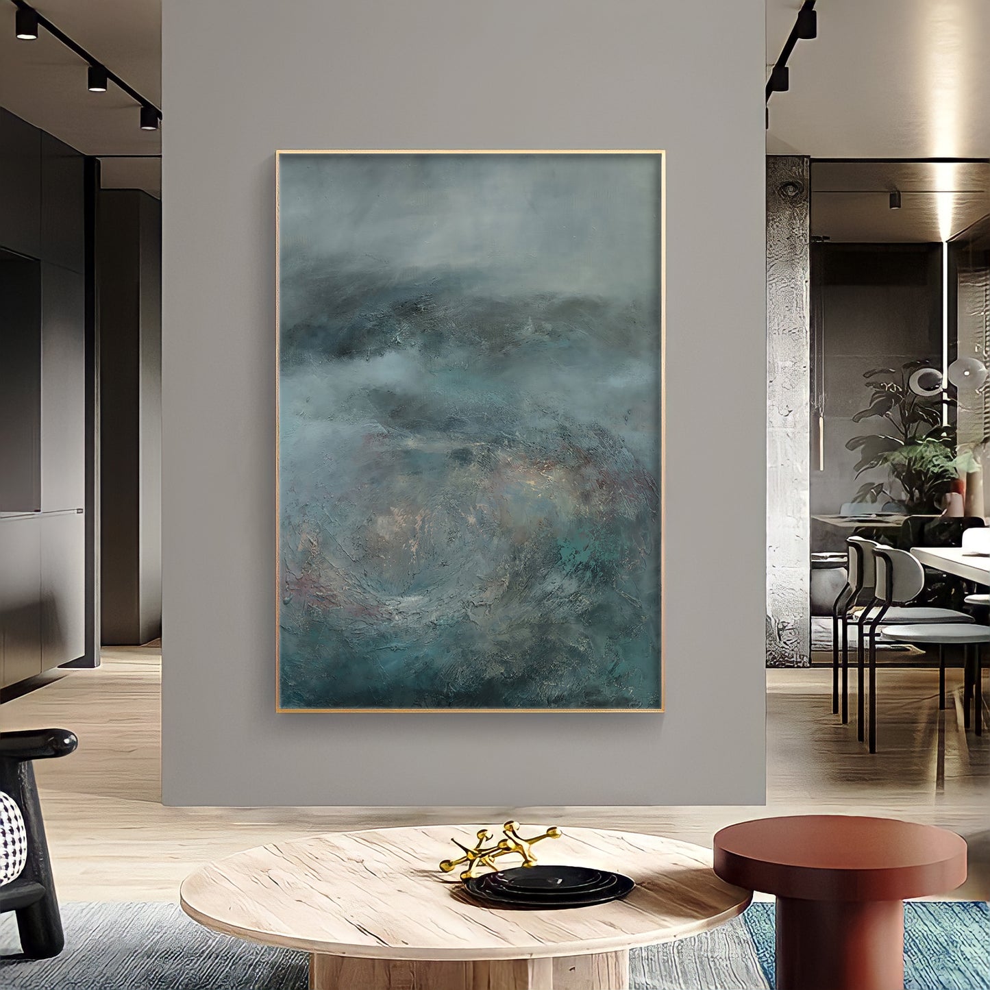 a painting hanging on a wall in a living room