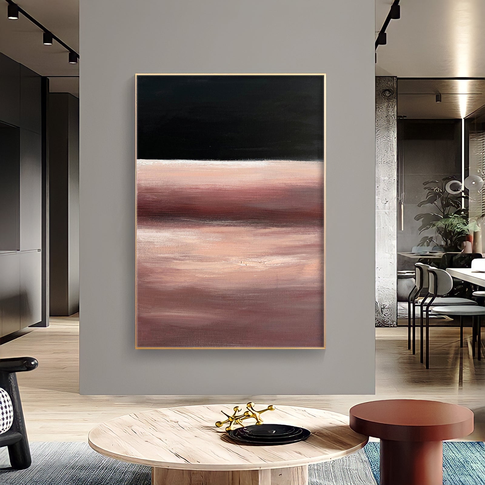 a painting hanging on a wall in a living room