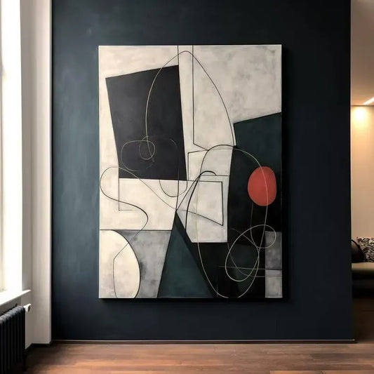 a large abstract painting hanging on a dark wall. The painting is composed of various geometric shapes and lines in different colors, creating a visually striking and dynamic composition.
