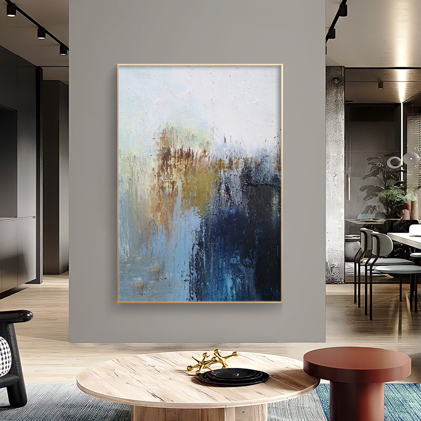 a painting hanging on a wall in a living room