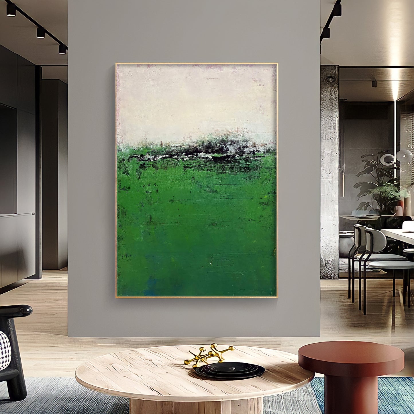 a painting hanging on a wall in a living room