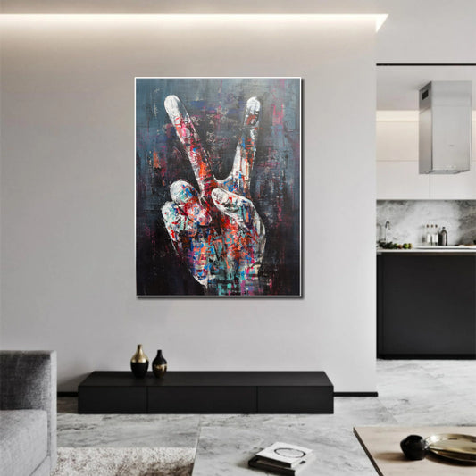 a large, colorful abstract painting of a hand making a peace sign on a wall in a modern living room setting.