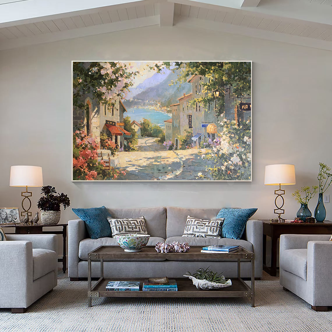 a living room filled with furniture and a painting on the wall