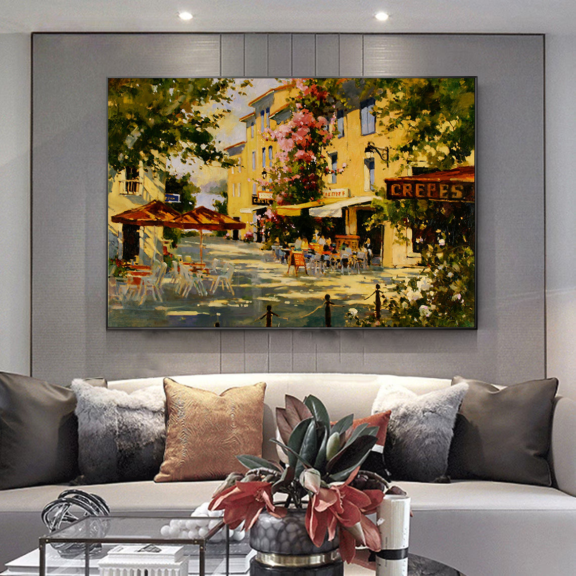 a living room filled with furniture and a painting on the wall