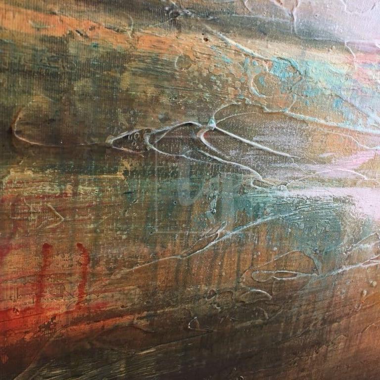 The image is a close-up of a textured surface with a mix of warm and cool colors, including shades of orange, green, and blue. The surface appears to be a painting or artwork, with visible brushstrokes and texture that create a sense of depth and dimension.