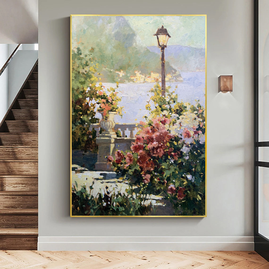 a painting hanging on a wall next to a stair case