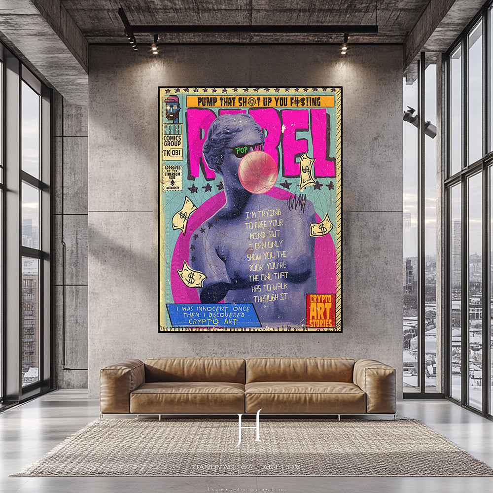 a living room with a couch and a poster on the wall