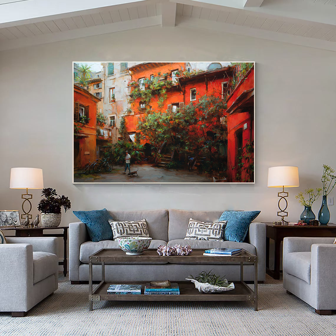 a living room filled with furniture and a painting on the wall