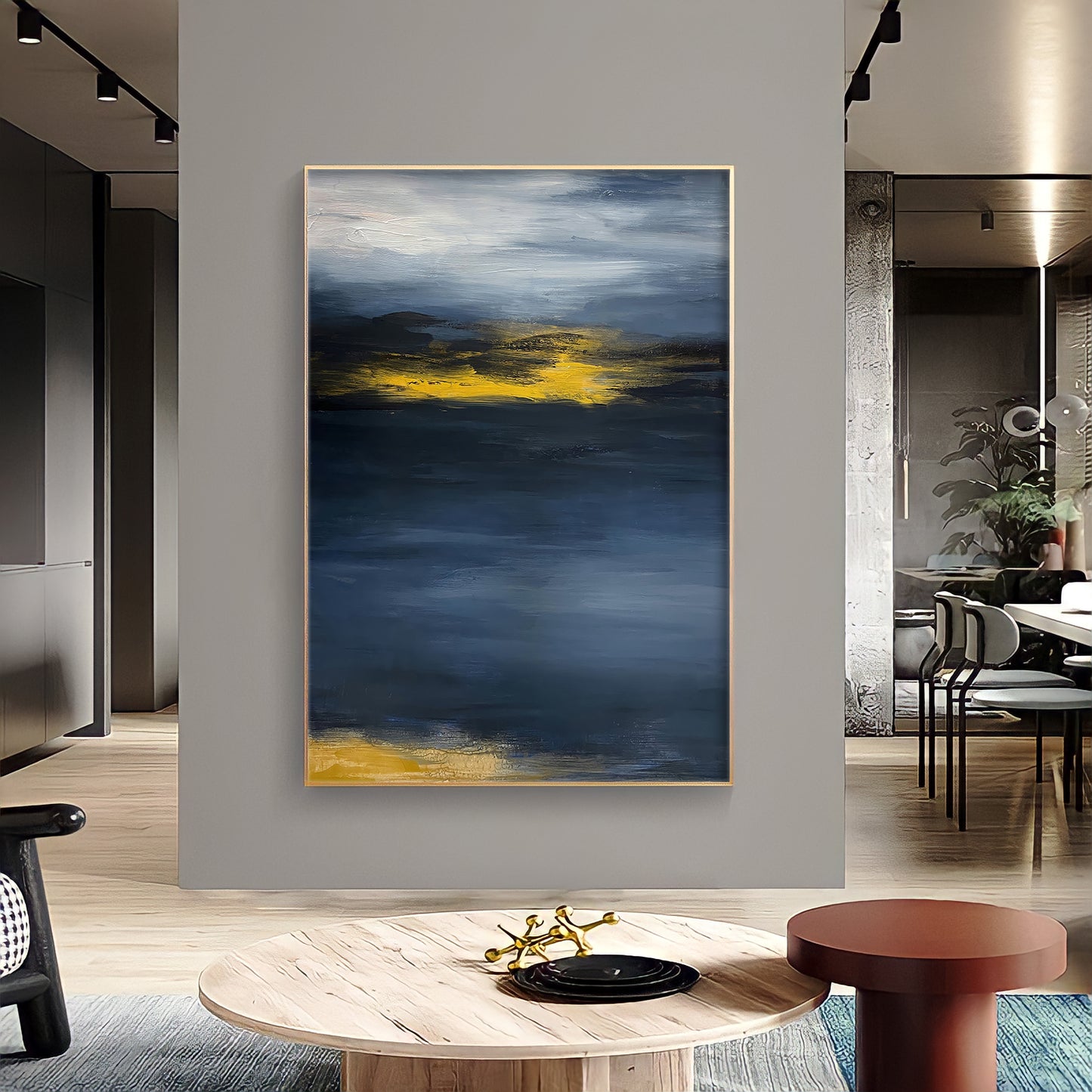 a painting hanging on a wall in a living room