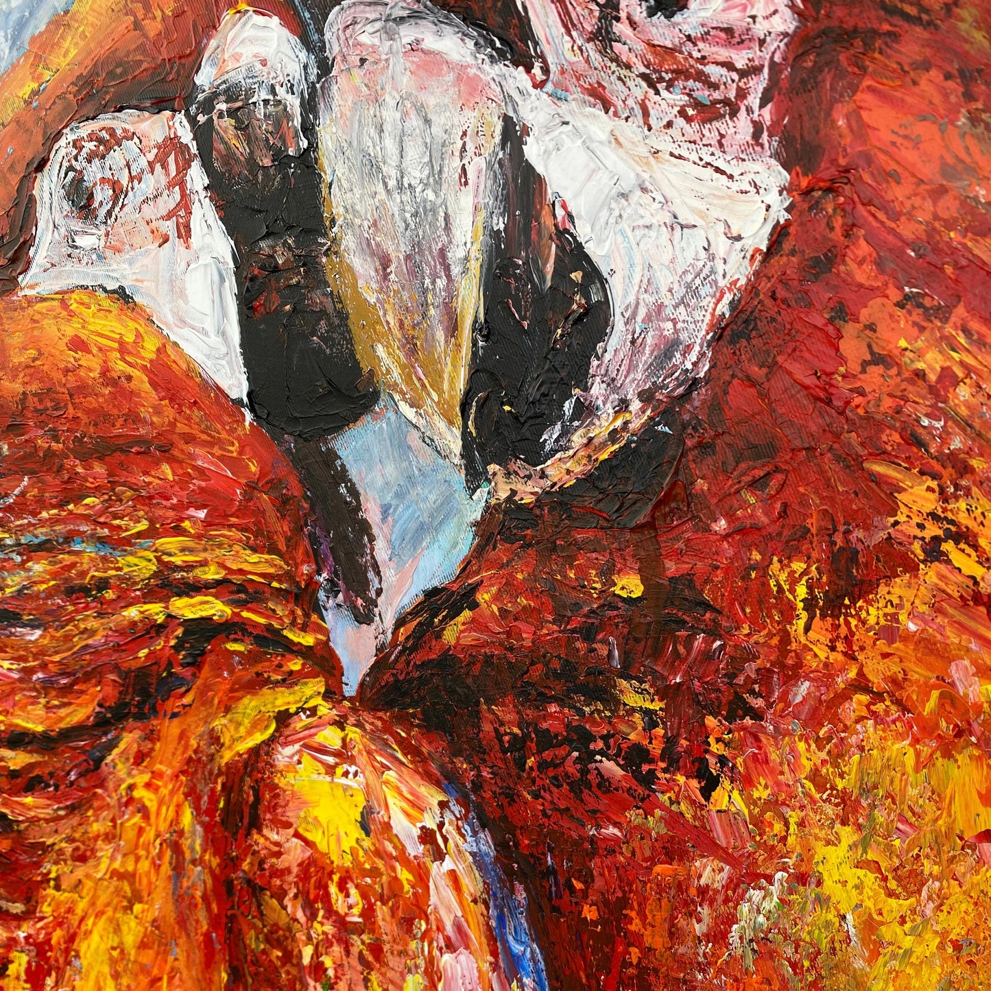 The image is an abstract painting with bold, vibrant colors and dynamic brushstrokes, creating a sense of movement and energy.
