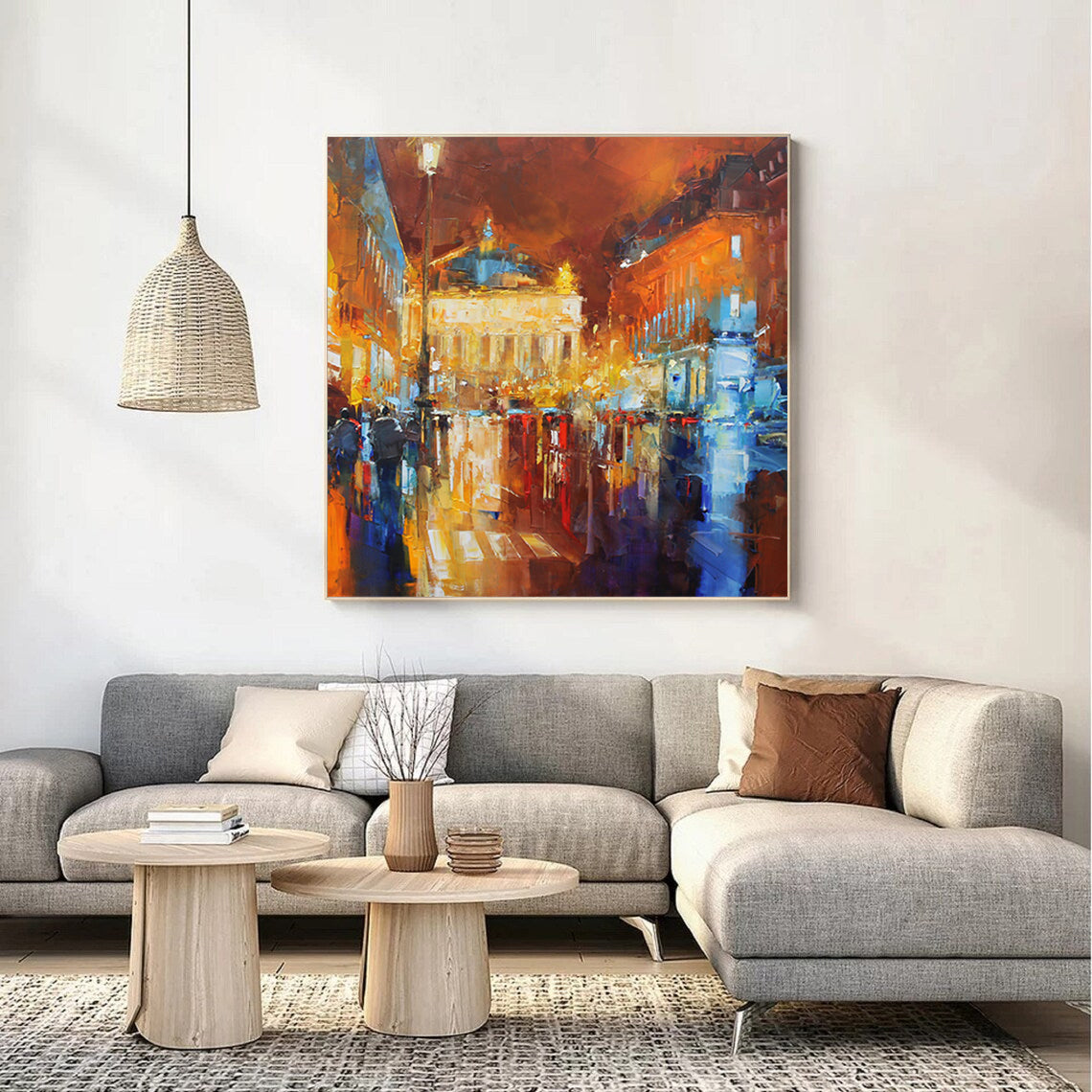 a living room with a large painting on the wall