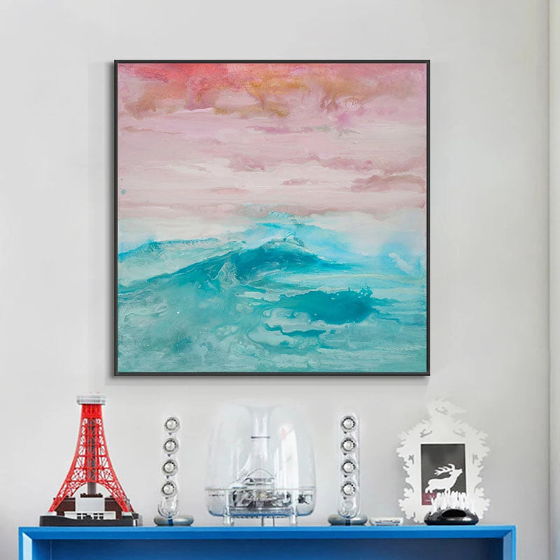a painting on a wall above a blue table