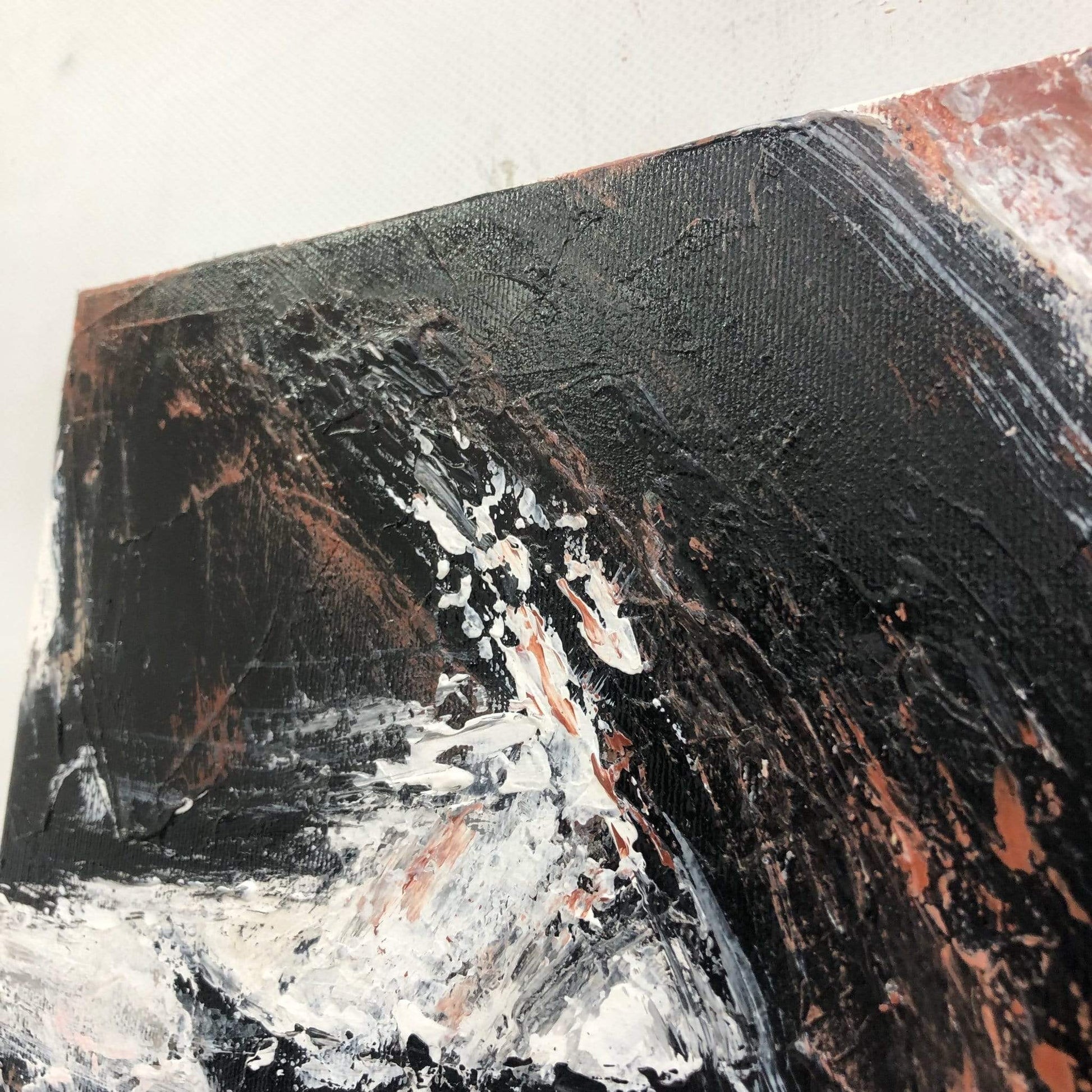 a close up of a black and white painting