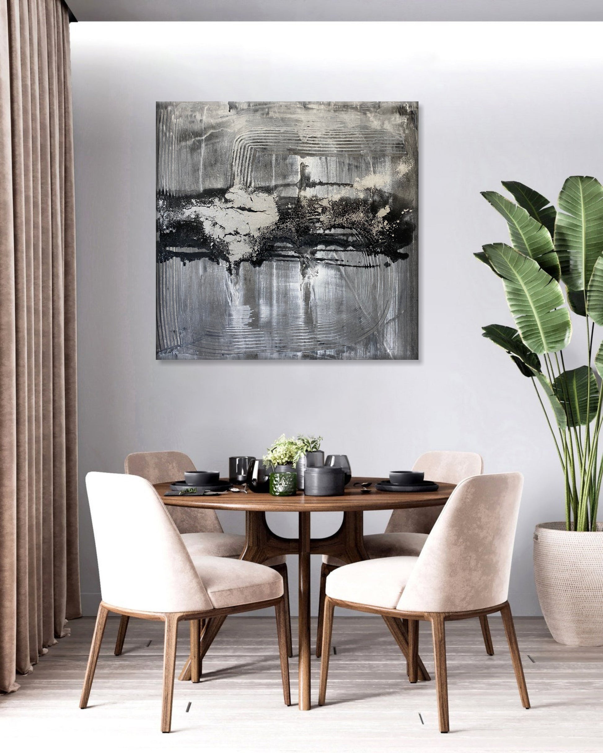 a dining room table with chairs and a painting on the wall