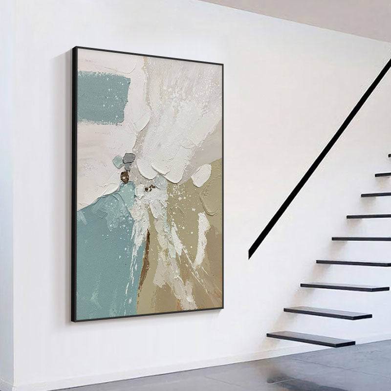 a painting hanging on a wall next to a stair case