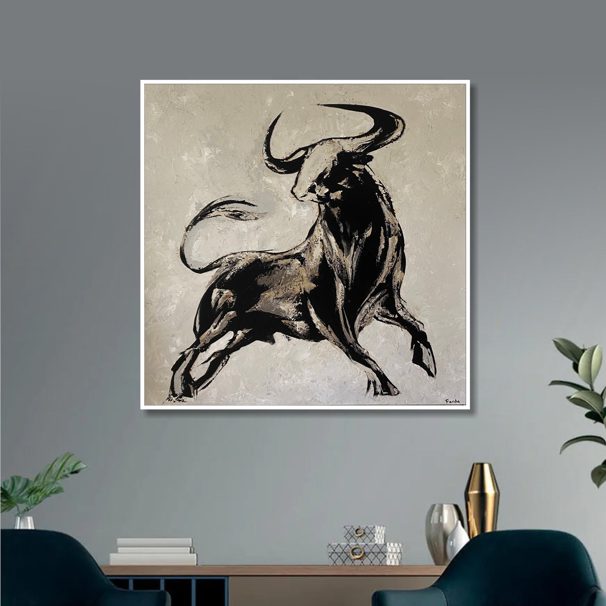 a painting of a bull on a wall