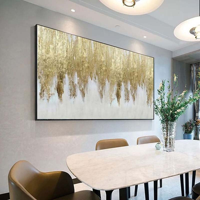 a dining room with a large painting on the wall