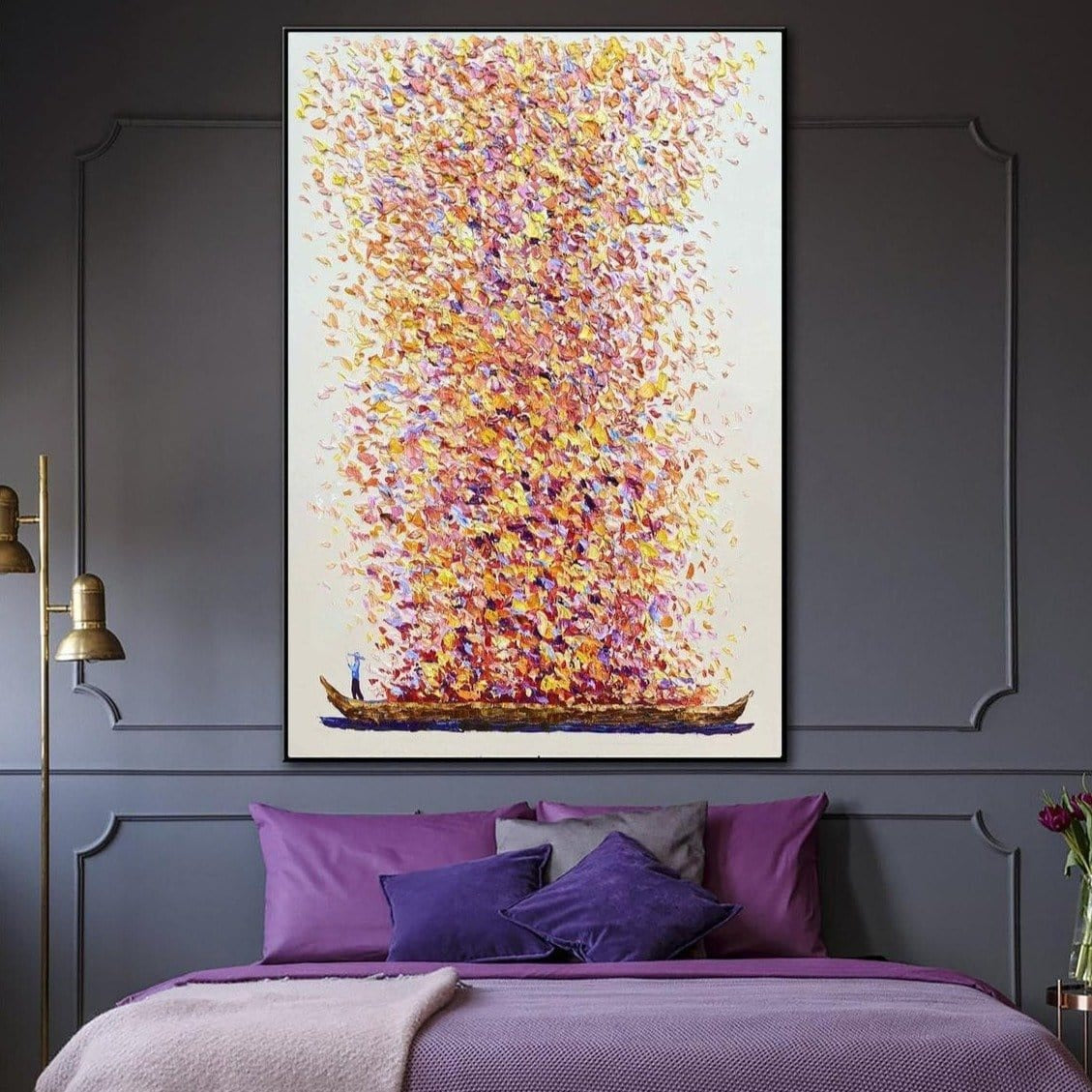 a large, vibrant painting of a boat on a river, hanging above a bed with purple pillows and a purple blanket.