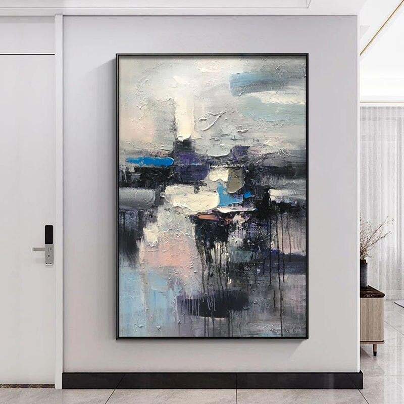 a painting hanging on a wall in a room