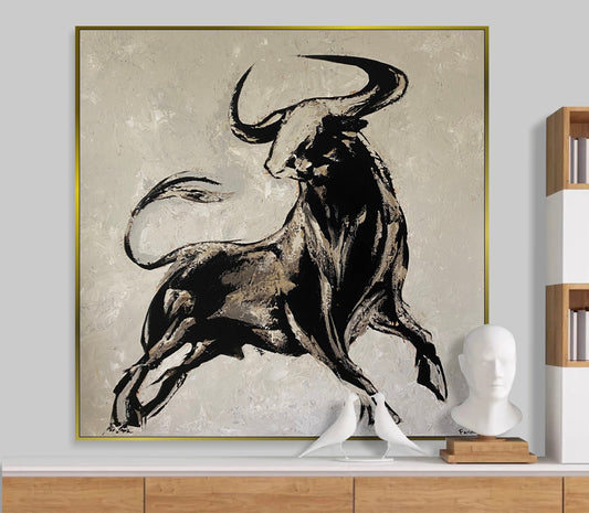 a painting of a bull on a wall