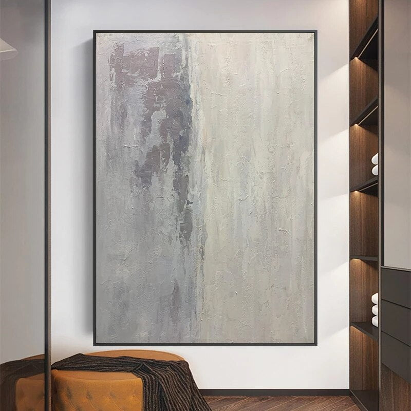 a painting hanging on a wall in a room