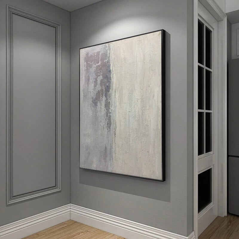 a painting hanging on a wall in a room