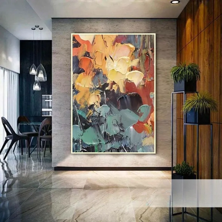a modern art piece with a large, abstract painting hanging on a wall in a contemporary living room setting.