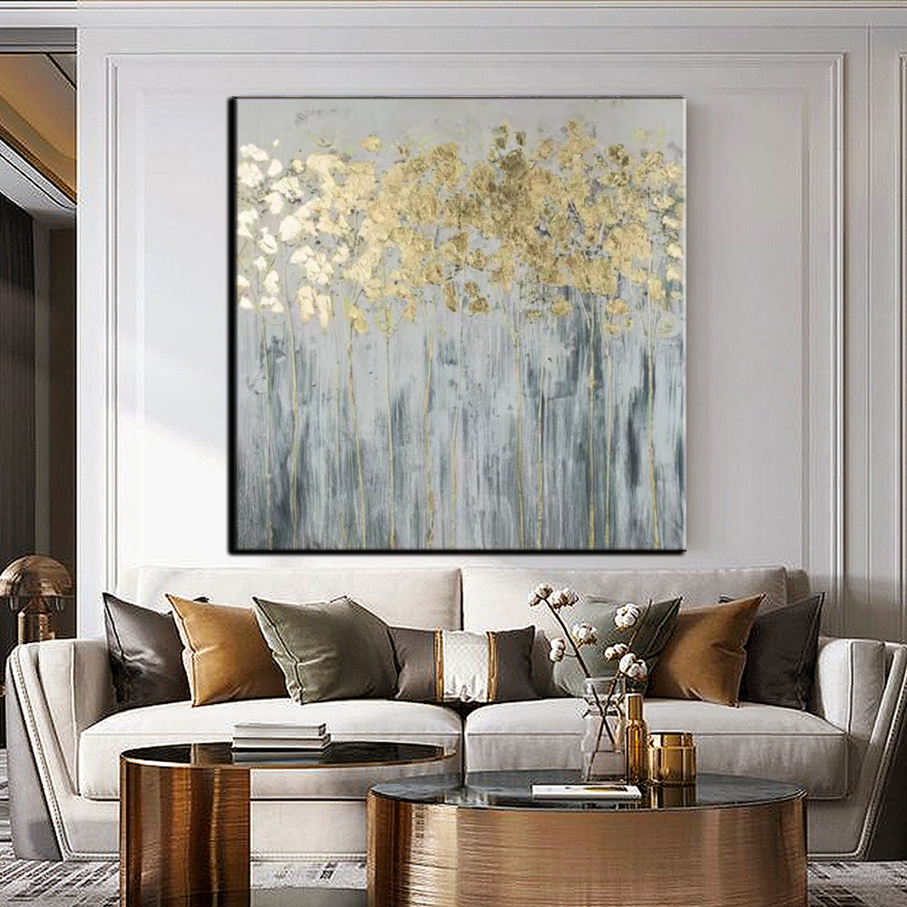 a living room filled with furniture and a painting on the wall