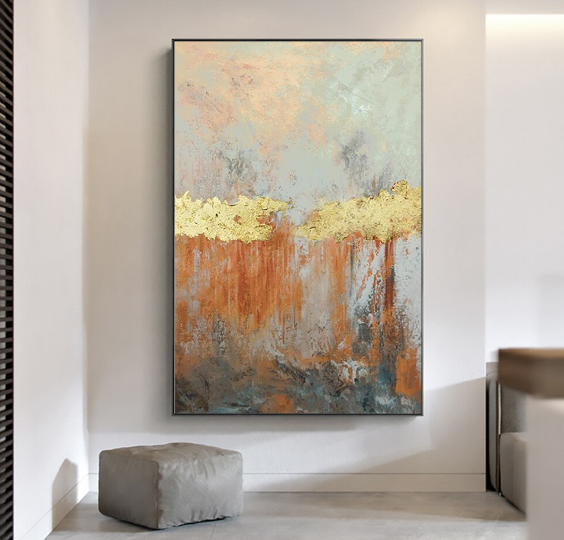 a painting hanging on a wall in a room