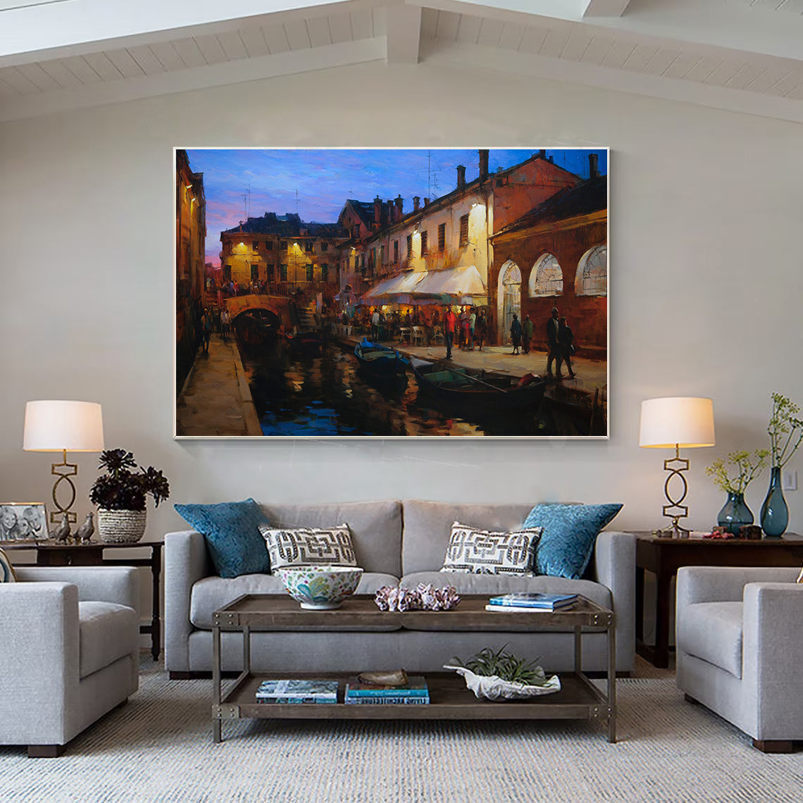 a living room filled with furniture and a painting on the wall