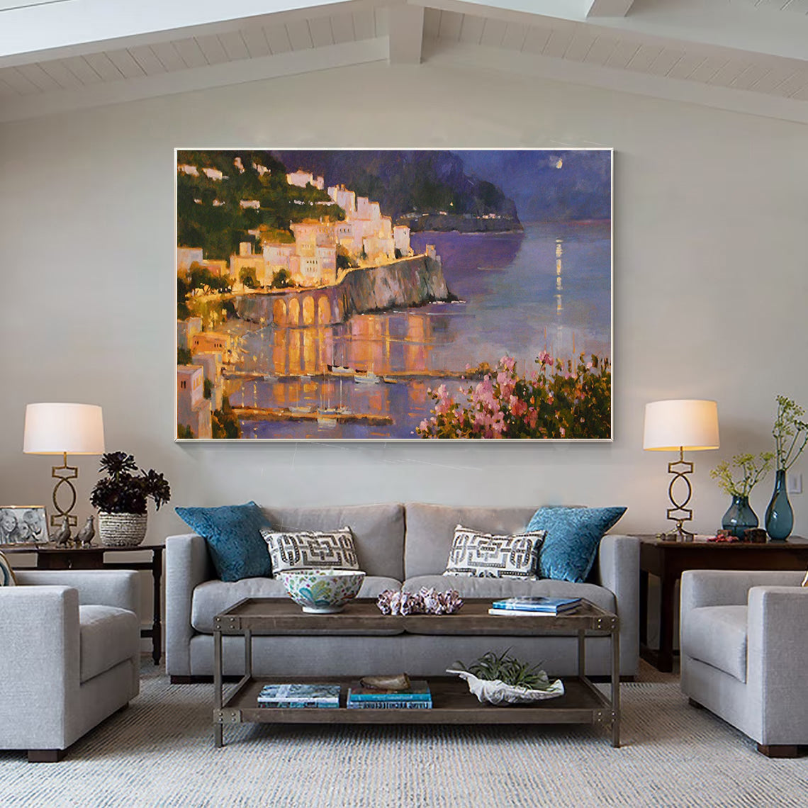 a living room filled with furniture and a painting on the wall