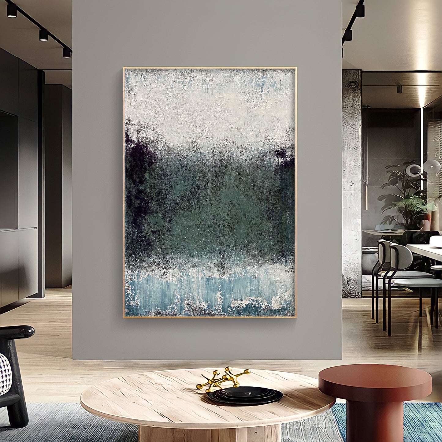 a painting hanging on a wall in a living room