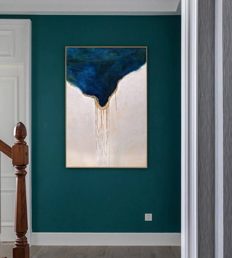 a painting hanging on the wall of a hallway