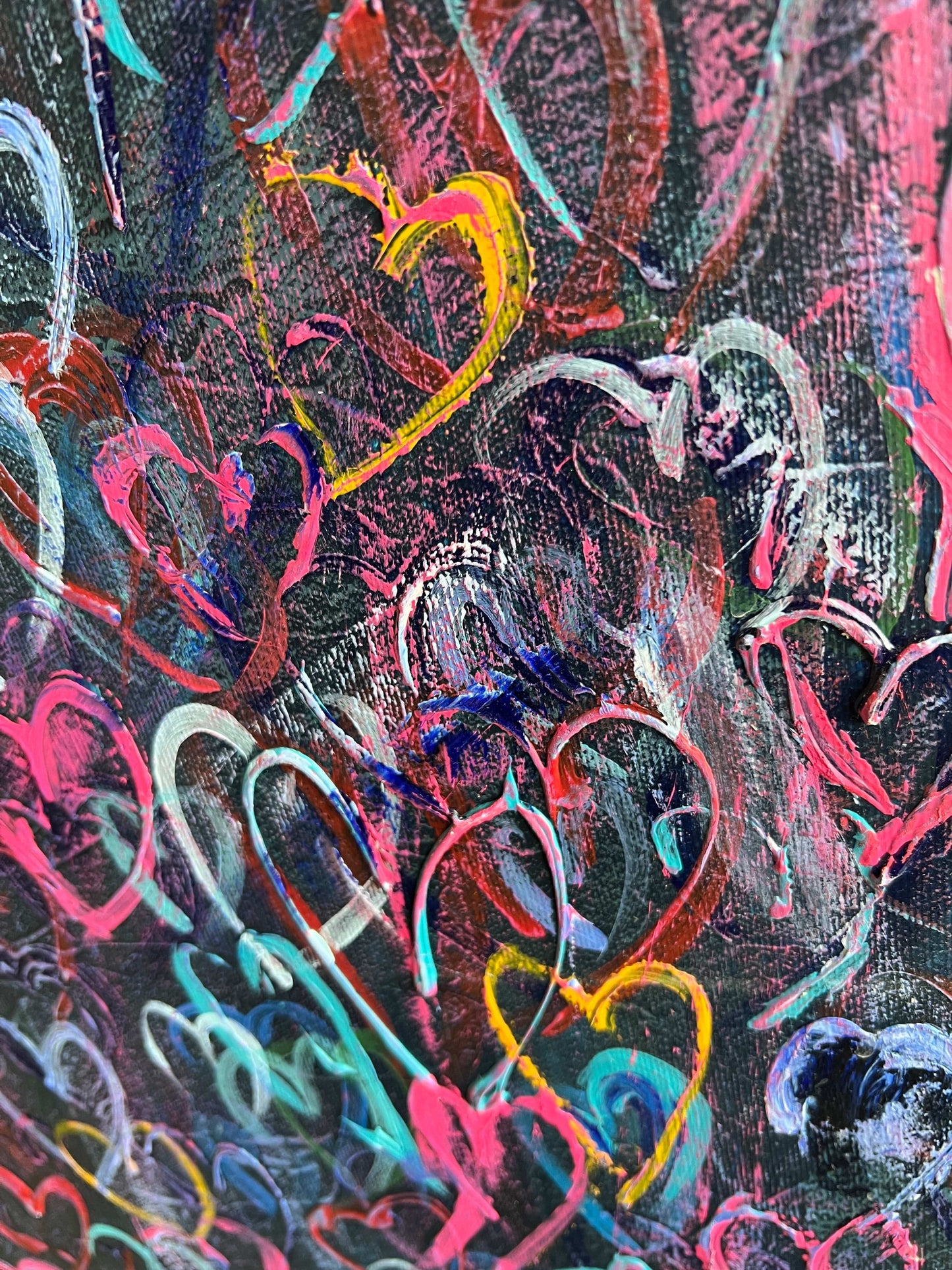 a close up of a painting of hearts