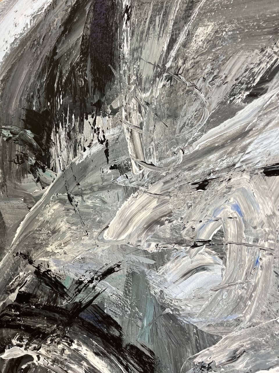 an abstract painting with black and white colors