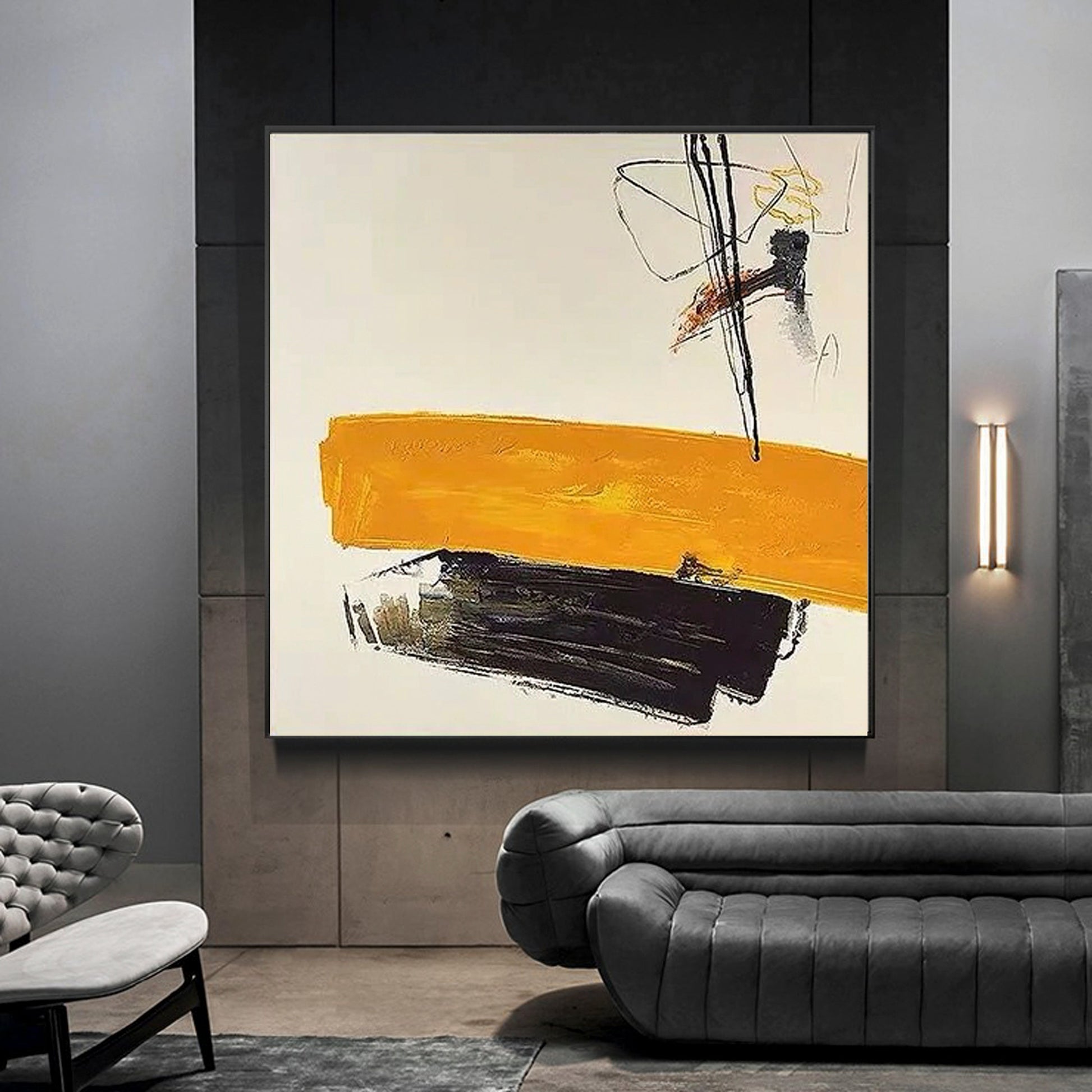 a living room with a couch and a painting on the wall